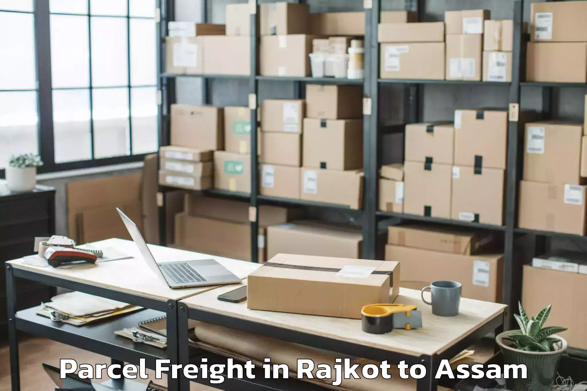 Efficient Rajkot to Mikirbheta Parcel Freight